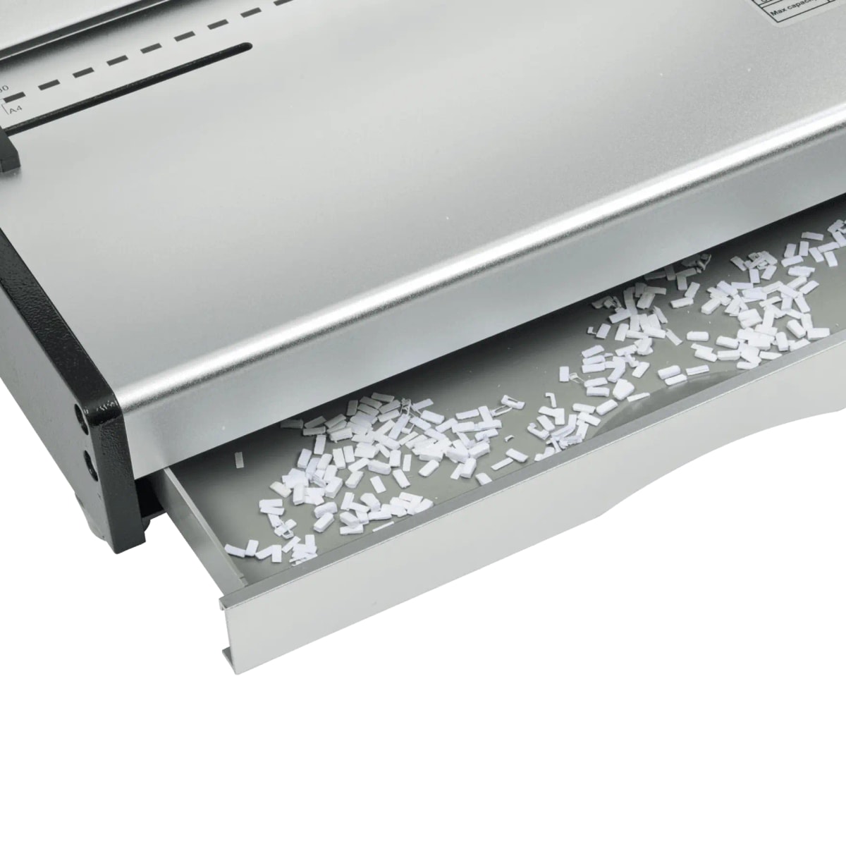 Bac à confettis ouvert de la perforelieuse GBC CB30 Pro.