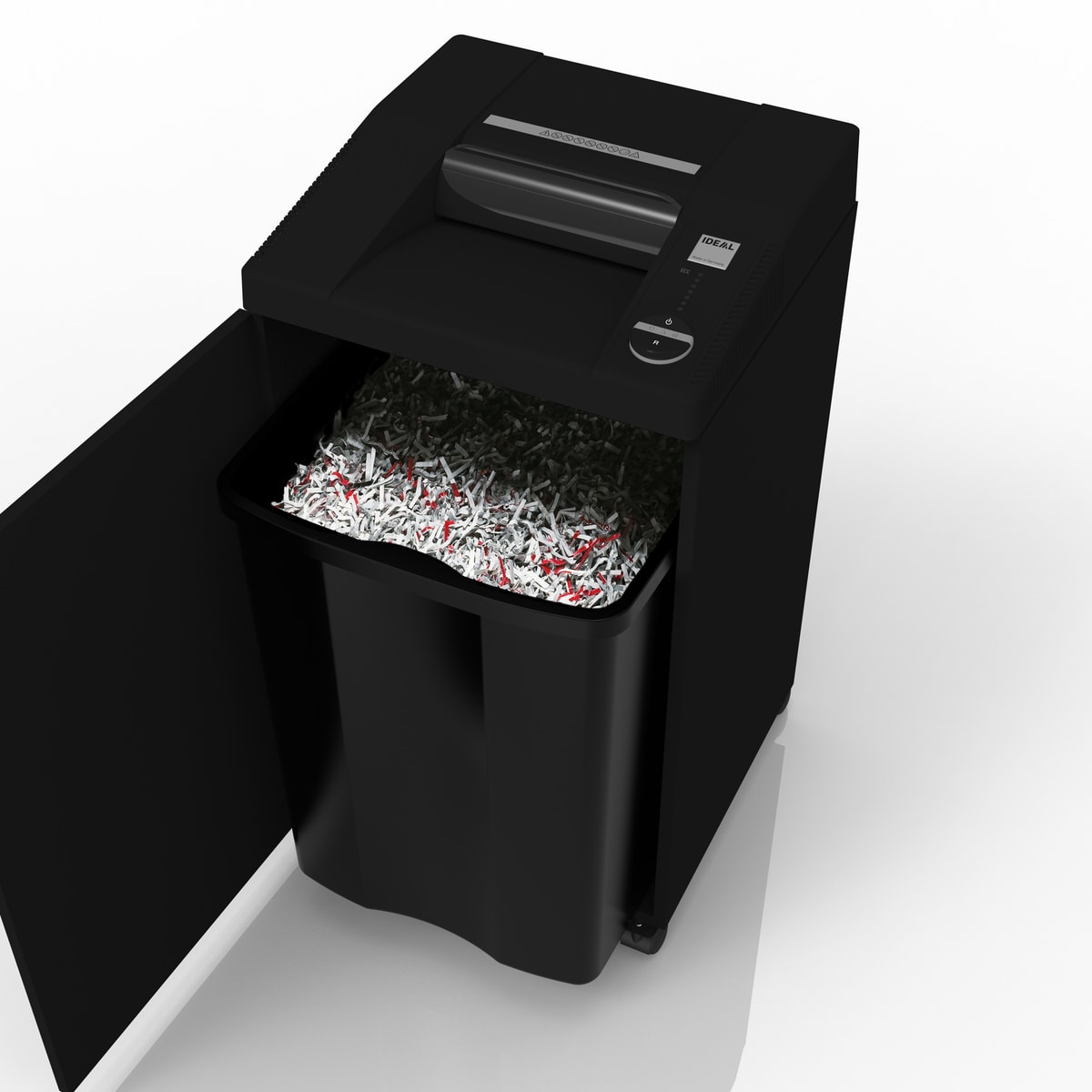 Porte ouverte sur le réceptacle de 100 litres rempli de particules.